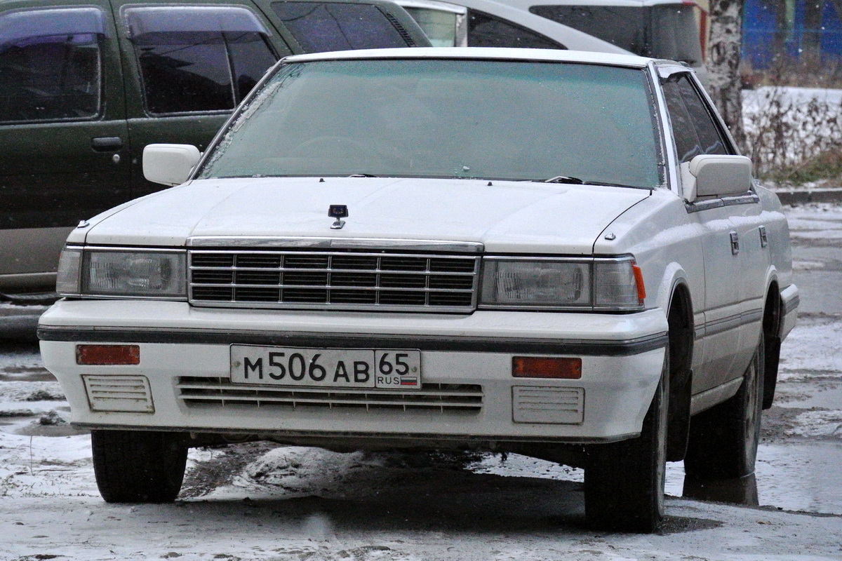 Сахалинская область, № М 506 АВ 65 — Nissan Laurel (C32) '84-93