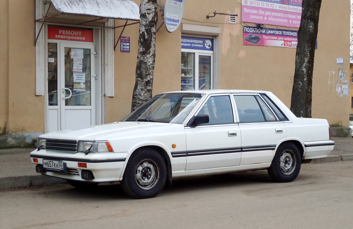 Псковская область, № М 657 КН 50 — Nissan Laurel (C32) '84-93