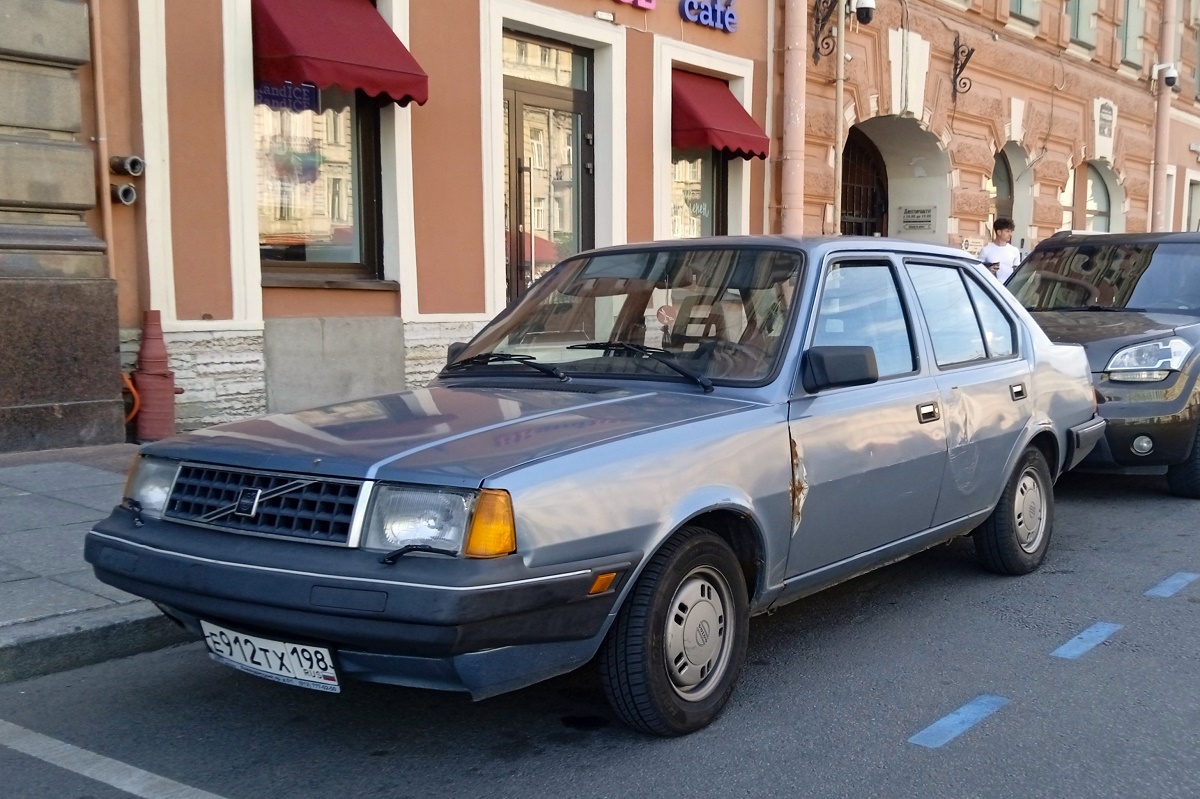 Санкт-Петербург, № Е 912 ТХ 198 — Volvo 300 Series (общая модель)