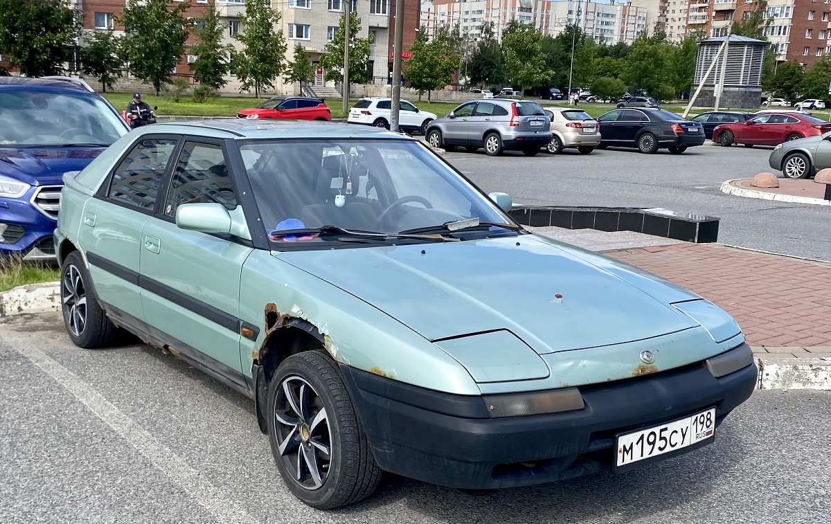 Санкт-Петербург, № М 195 СУ 198 — Mazda 323 (BG) '89-94