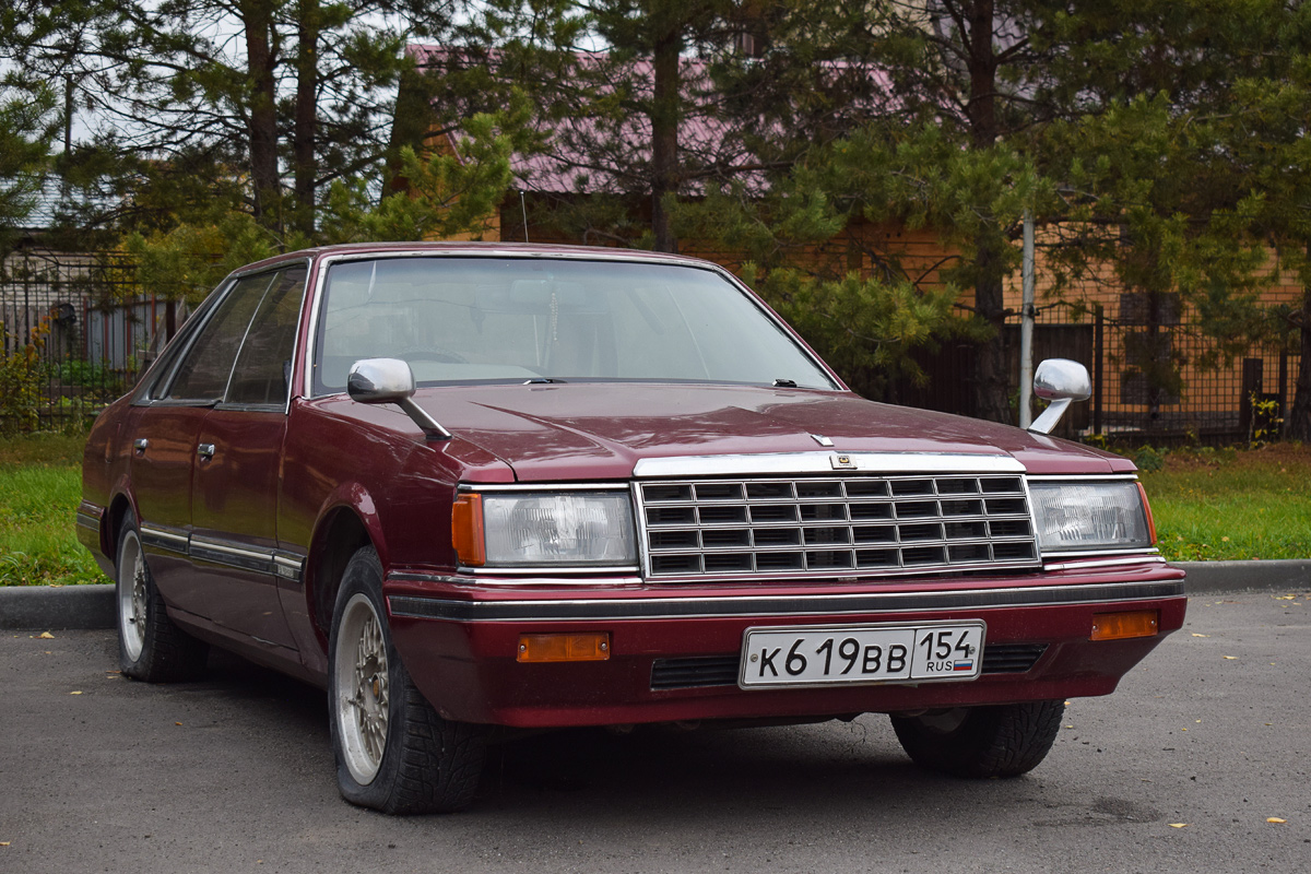 Новосибирская область, № К 619 ВВ 154 — Nissan Laurel (C31) '80-84