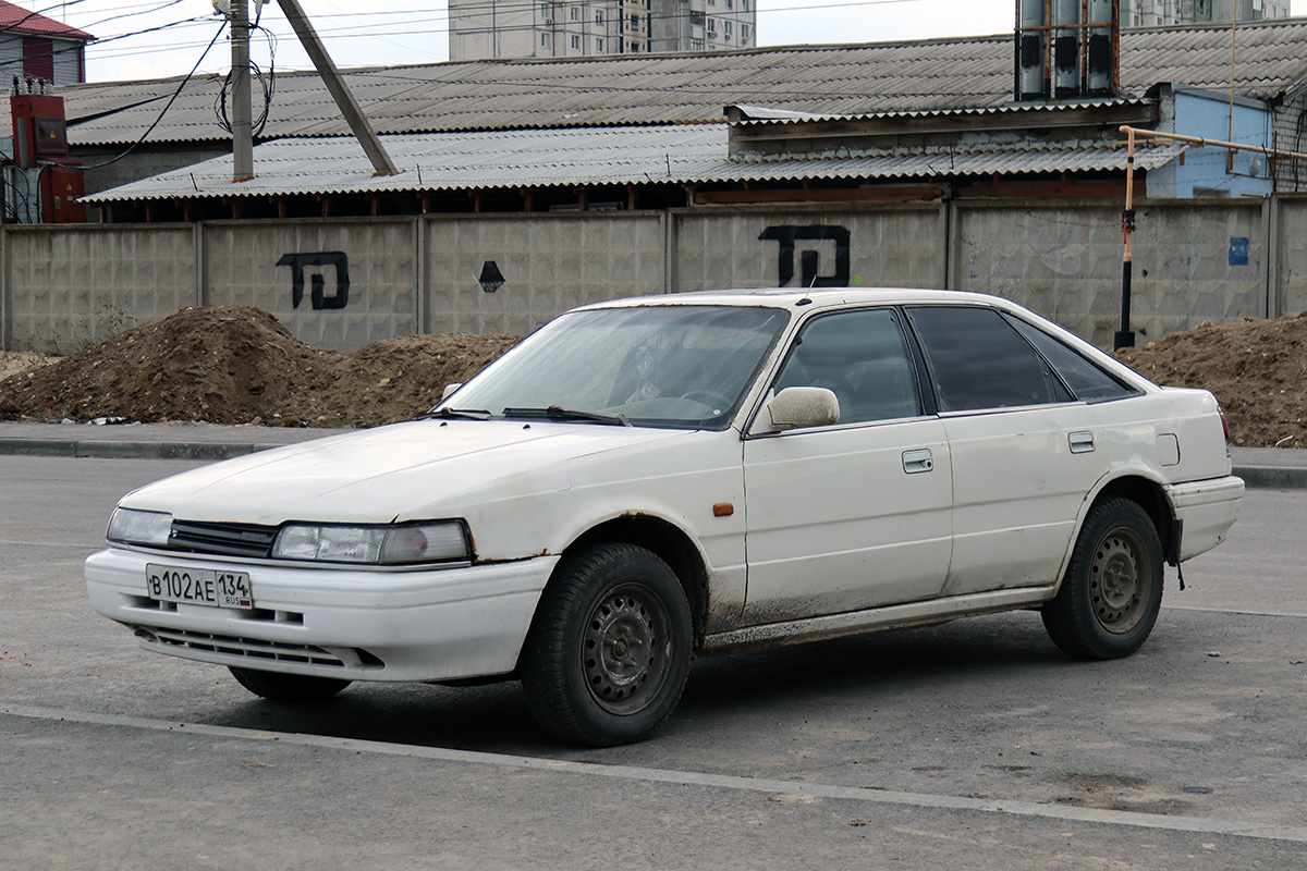 Волгоградская область, № В 102 АЕ 134 — Mazda 626 (GD/GV) '87-97