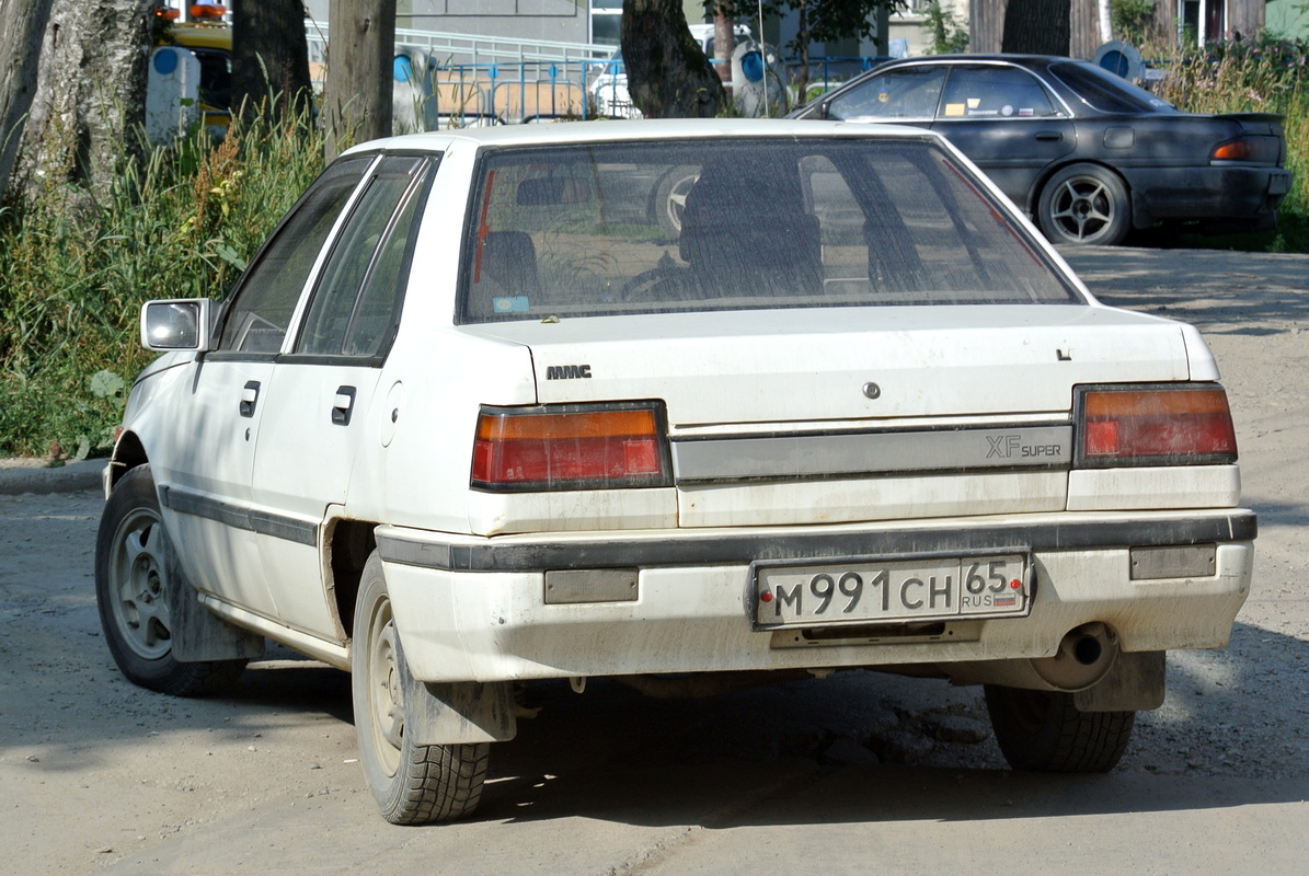 Сахалинская область, № М 991 СН 65 — Mitsubishi Lancer Fiore (2G) '83-88