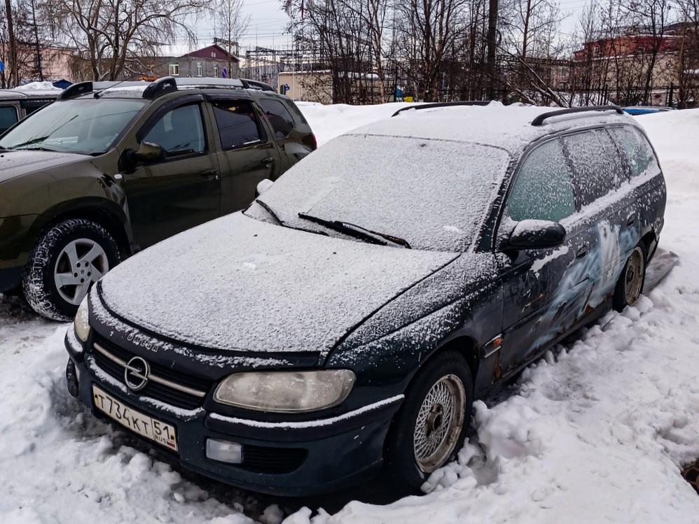 Мурманская область, № Т 734 КТ 51 — Opel Omega (B) Caravan '94-99