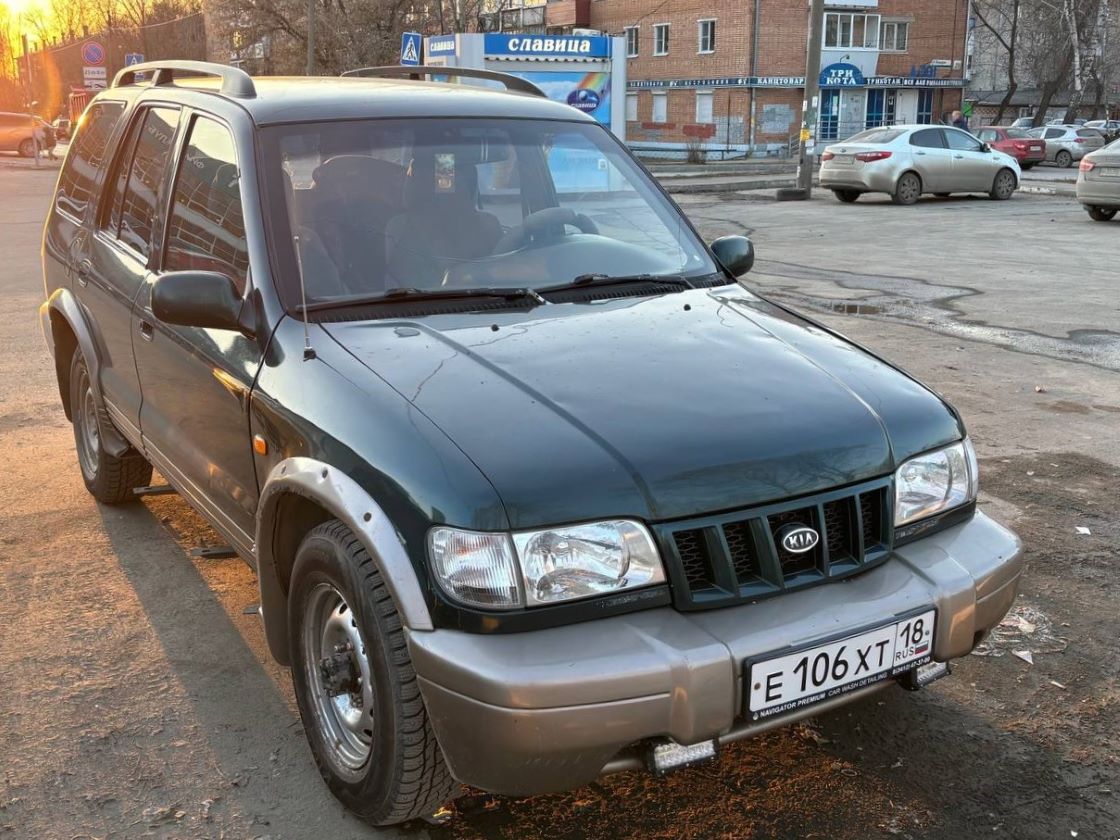 Удмуртия, № Е 106 ХТ 18 — Kia Sportage (Автотор) '01-06
