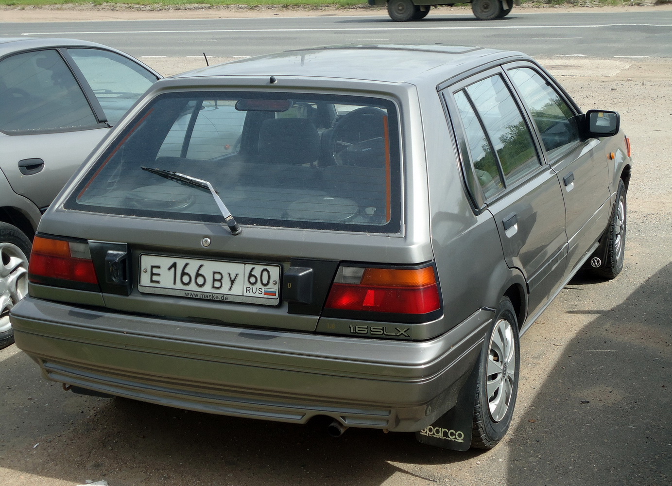 Псковская область, № Е 166 ВУ 60 — Nissan Sunny (N13) '86-90