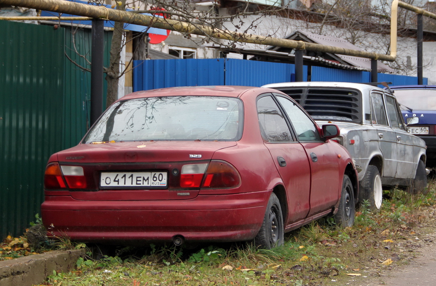 Псковская область, № О 411 ЕМ 60 — Mazda 323 (BH/BA) '94-00