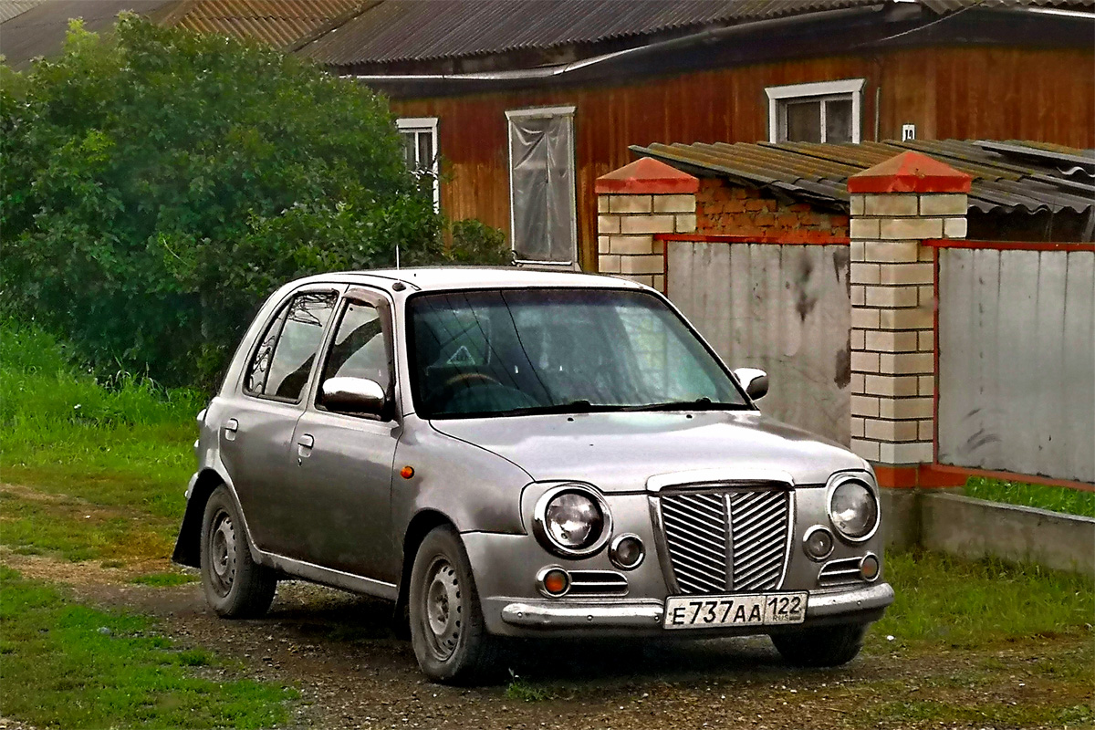 Алтайский край, № Е 737 АА 122 — Nissan March Bolero (K11) '97-03