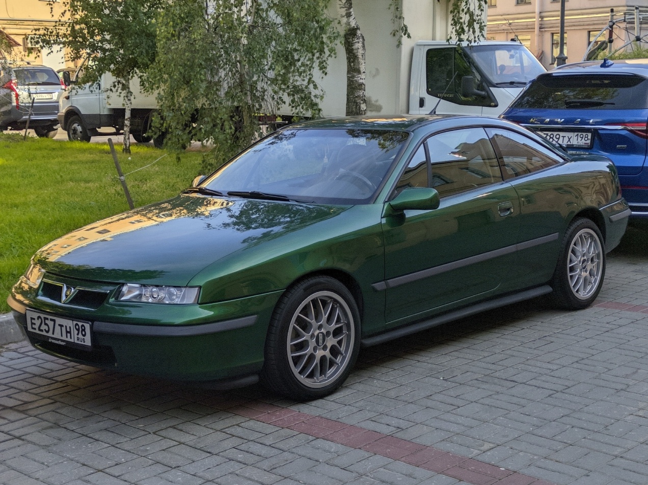Санкт-Петербург, № Е 257 ТН 98 — Opel Calibra '89-97