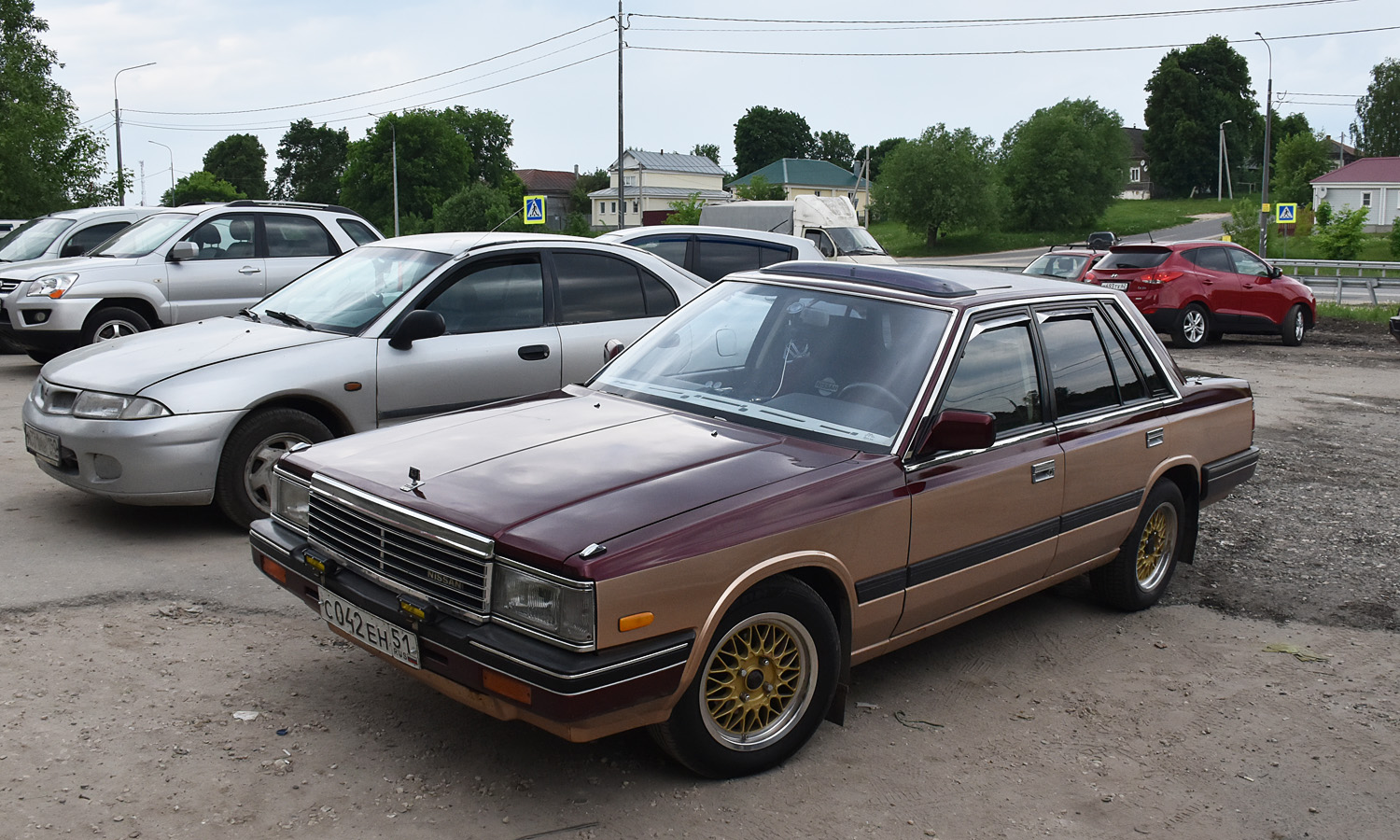 Мурманская область, № С 042 ЕН 51 — Nissan Laurel (C32) '84-93