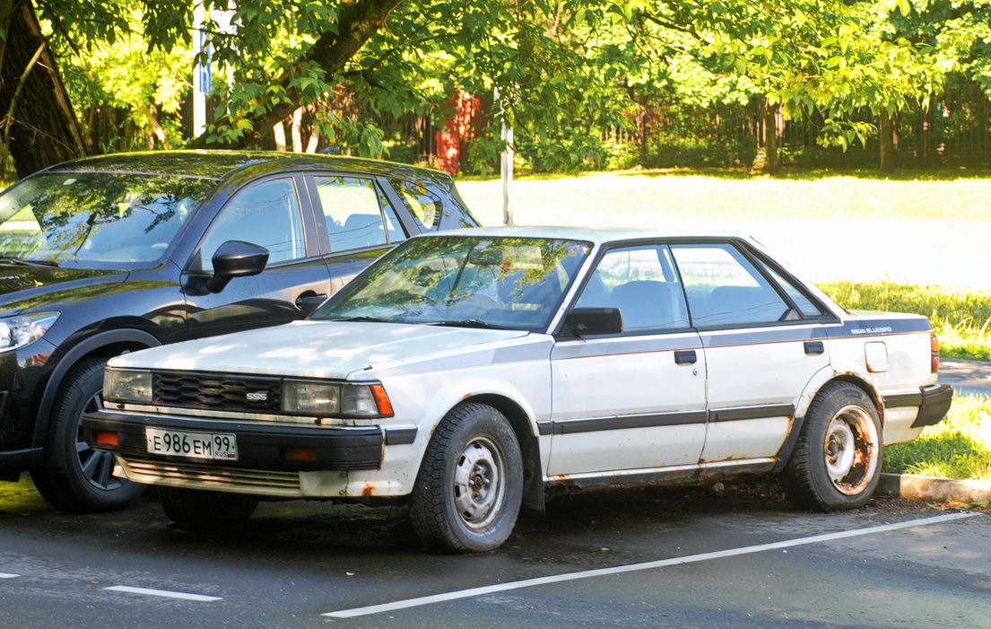 Москва, № Е 986 ЕМ 99 — Nissan Bluebird (U11) '83-90