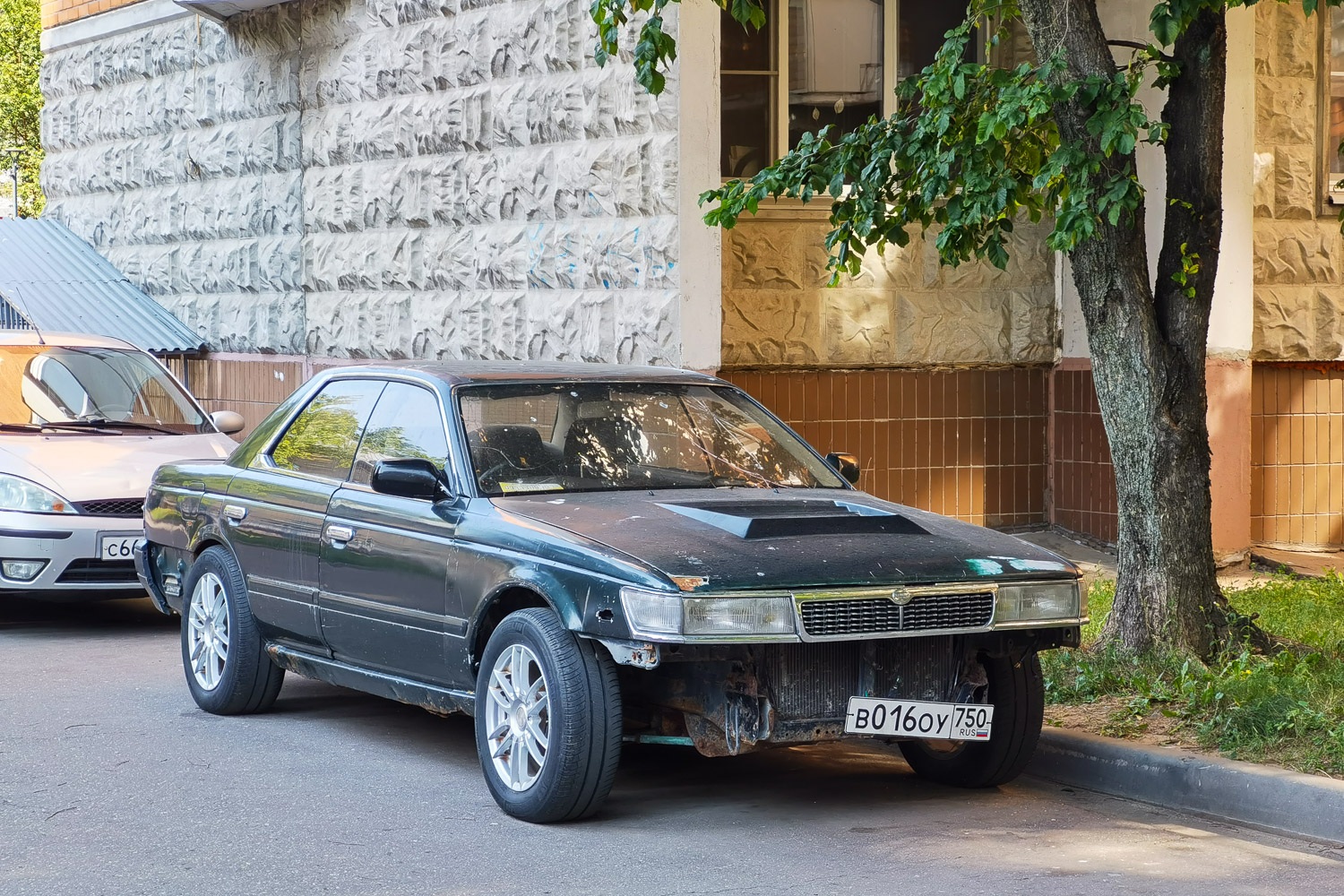 Московская область, № В 016 ОУ 750 — Nissan Laurel (C33) '89-93