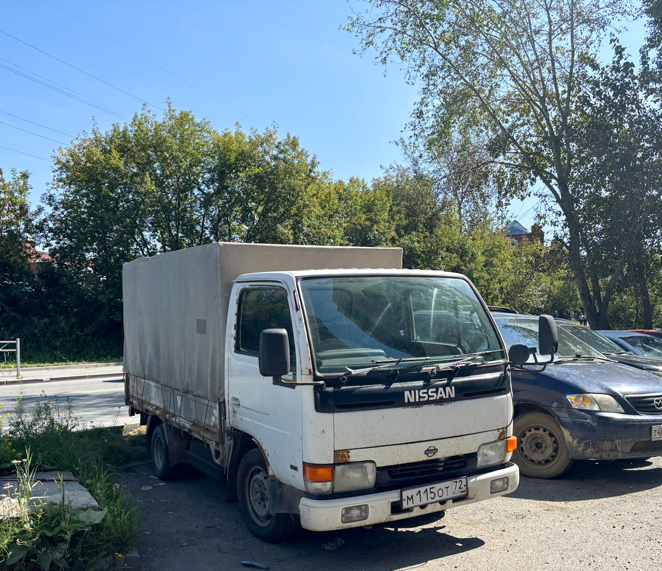 Тюменская область, № М 115 ОТ 72 — Nissan Atlas (F23/H41) '92-07