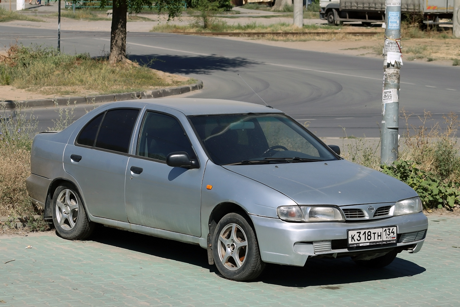 Волгоградская область, № К 318 ТН 134 — Nissan Almera (N15) '95-00